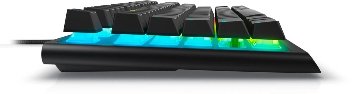 "Side view of the Alienware AW420K showcasing its adjustable height feet and slim profile."