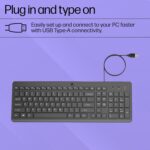 "Close-up of the ergonomic shape of the HP 150 Wired Keyboard, designed for comfortable typing during extended work sessions."